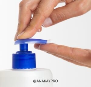 Autumn skincare routine on a bathroom counter; applying moisturiser to damp skin; gentle cleanser and moisturiser; hydrated skin in autumn light; foundation being applied in a thin layer.